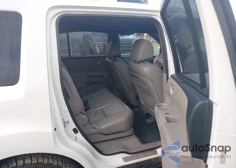 2011 Honda Pilot Touring z USA, uszkodzony, nr VIN 5FNYF4H95BB092349